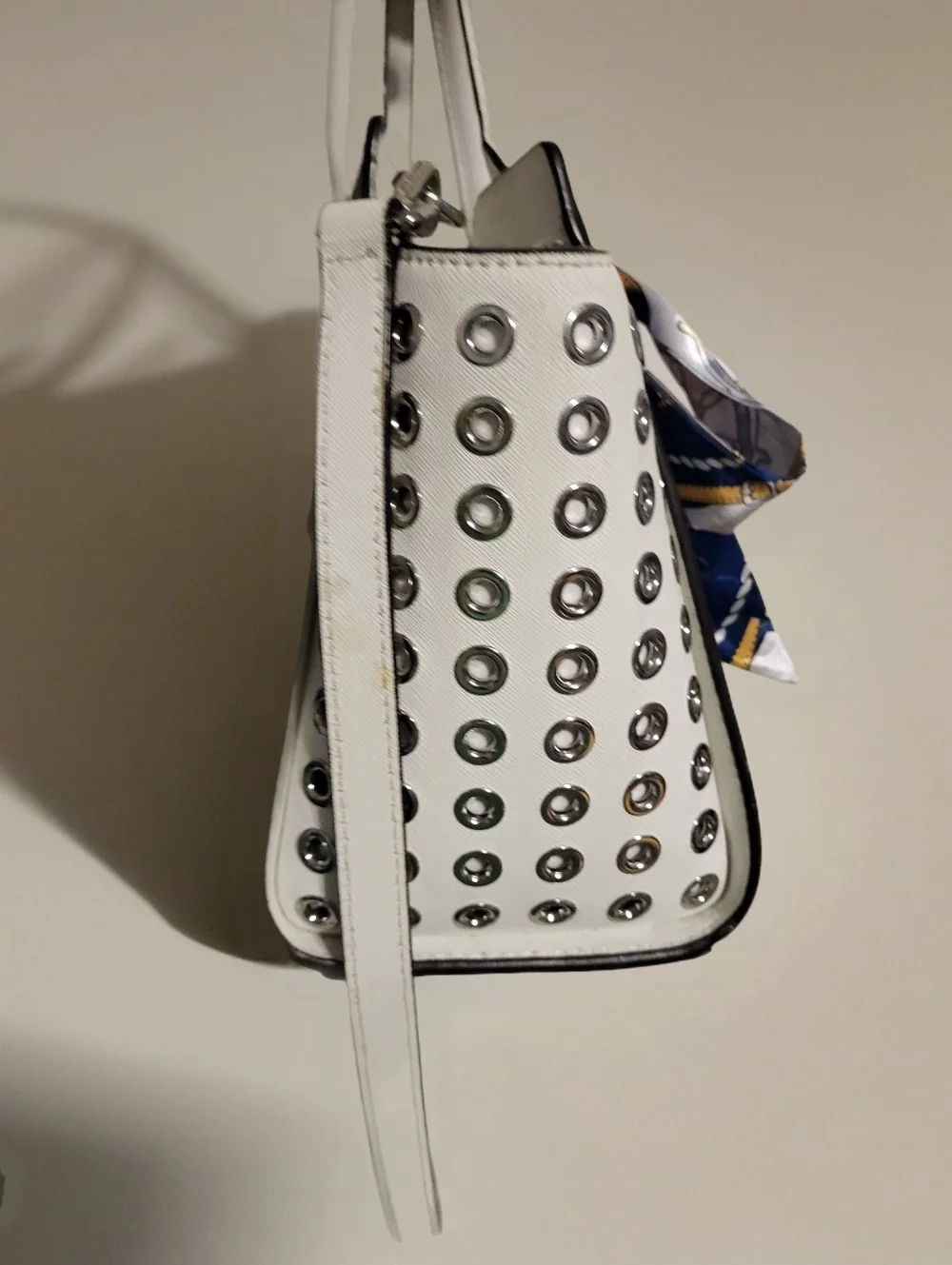 Michael Kors White Leather Satchel with Silver Metal Grommets.